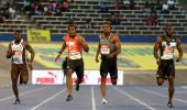 Blake completes Jamaican sprint double in Bolt's absence