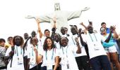 First-ever refugee team ascends to Rio's Christ statue