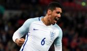 PHOTOS: Smalling smiling after England sink Portugal