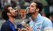 Lopez and Lopez break Grand Slam duck in Paris