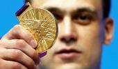 Ilyin stripped of Beijing, London weightlifting golds for doping