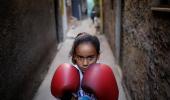 Boxing school in Rio slum shows sport's power before Olympics