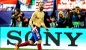 Champions League PIX: Atletico win thrilling shootout to reach quarters