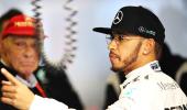 Australian Grand Prix: Hamilton quickest, Rosberg crashes in rain