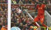 EPL PIX: Benteke salvages point for Liverpool; Norwich go down