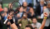 French Open PIX: Wawrinka, Muguruza reach quarters; Raonic ousted