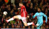 PHOTOS: Rooney ignites Man Utd; Inter slump out of Europe