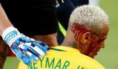 Neymar left bloodied in Brazil's thumping win; Argentina held