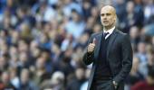 City's Guardiola makes emotional return to Barca