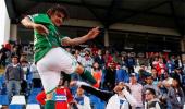 Chilean footballer does a Cantona, kicks spectator after match