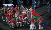 Belarus delegate carries Russian flag during Rio opening ceremony