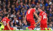 EPL PHOTOS: Henderson stunner headlines Liverpool win over Chelsea