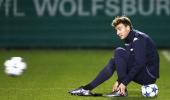 Wenger surprised by Bendtner's move to Forest