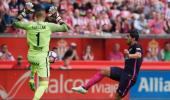 Barcelona cruise past Sporting Gijon without Messi