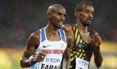 Farah advances in 5,000 metre for final assault on track gold