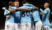 EPL PHOTOS: City down United in derby; Arsenal and Liverpool held