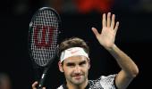 PHOTOS: Federer makes winning return at Australian Open