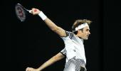 PHOTOS: Vintage Federer hammers Berdych to reach Aus Open last 16