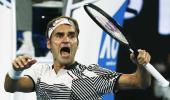 PHOTOS: Resilient Federer holds off Nishikori to reach quarter-finals