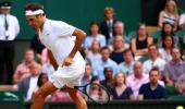 Federer subdues old-school Zverev to reach Wimbledon last 16