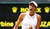 Muguruza crushes Rybarikova to storm into Wimbledon final