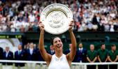 Wimbledon champion Muguruza eyes more trophies not rankings