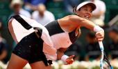 French Open PIX: Muguruza, Raonic, Thiem through; Dimitrov, Goffin out