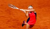 Bacsinszky knocks out French favourite Mladenovic in Paris