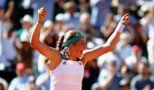 Unseeded Ostapenko stuns Halep to win French Open crown