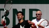 McEnroe urges Agassi to spend more time with Djokovic