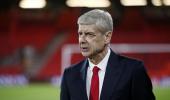 Under fire at Arsenal, Wenger linked to Barcelona move