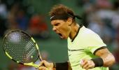 PHOTOS: Nadal wins in 1000th match, Raonic withdraws