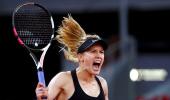 'Motivated' Bouchard claims victory over Sharapova in thriller