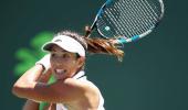 Italian Open: Muguruza survives day of shocks, Kerber out