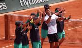 Djokovic makes winning French Open start on Agassi's watch