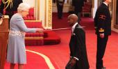 PIX: Four-time Olympic champion Mo Farah receives knighthood