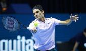 Razor-sharp Federer races through in Basel