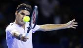 Federer digs deep to beat Mannarino and reach semis