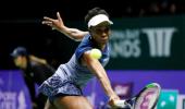 Evergreen Venus rallies past Garcia to set up Wozniacki final