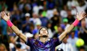 US Open PIX: Ailing Del Potro survives, Federer eases through