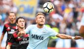 Football Briefs: Immobile hat-trick destroys Milan's perfect record