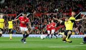 Rashford double helps Manchester United sink Burton