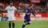 Soccer briefs: Messi to Barca's rescue; easy for Real Madrid