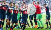 Football Briefs: Bayern overcome bizarre own goal to clinch another title