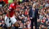 EPL: Fellaini header condemns Wenger to Old Trafford defeat