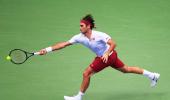 US Open PIX: Federer, Djokovic advance; Wozniacki crashes out