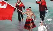 Tonga's flag bearer goes shirtless again at Winter Olympics