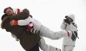 Winter OIympics PIX: US snowboarder White stamps legacy with third gold