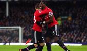 PHOTOS: United ease past Everton, Liverpool clinch late win