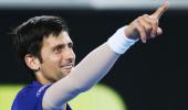 Djokovic makes service change as elbow still not '100 percent healed'